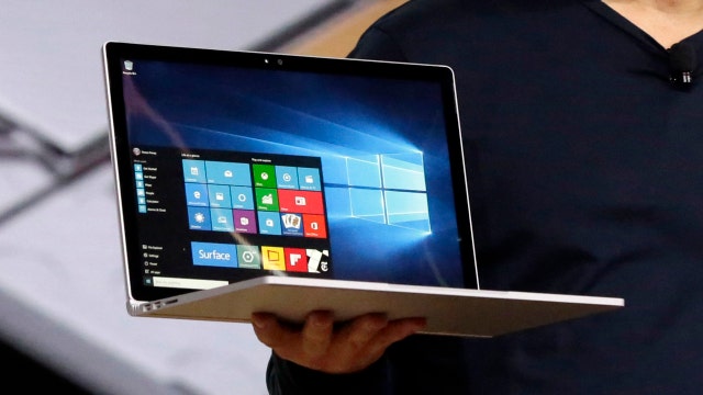 Microsoft takes on Apple with new laptop