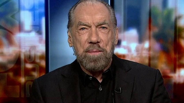 Paul Mitchell Co-Founder John Paul DeJoria on the steps to improving the economic environment for business, Anheuser-Busch InBev’s deal for SABMiller, the latest consumer trends and Benghazi.