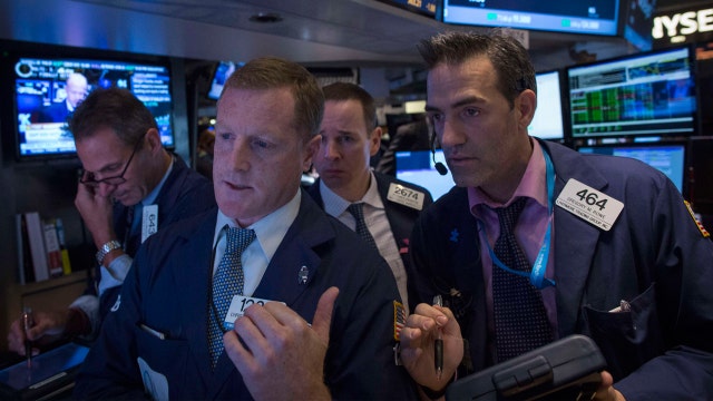 Dow snaps win streak as major averages close lower