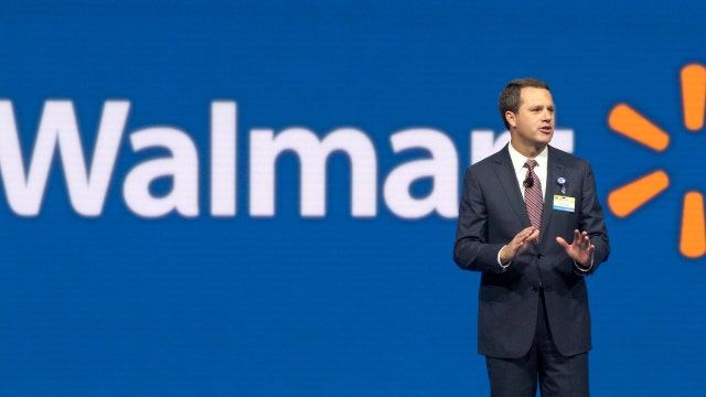 Walmart warns weak dollar will drag down earnings