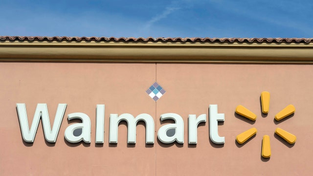 Walmart shares tumble on warning of flat 2016 sales