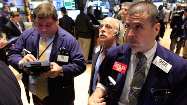 Stocks end trading day flat