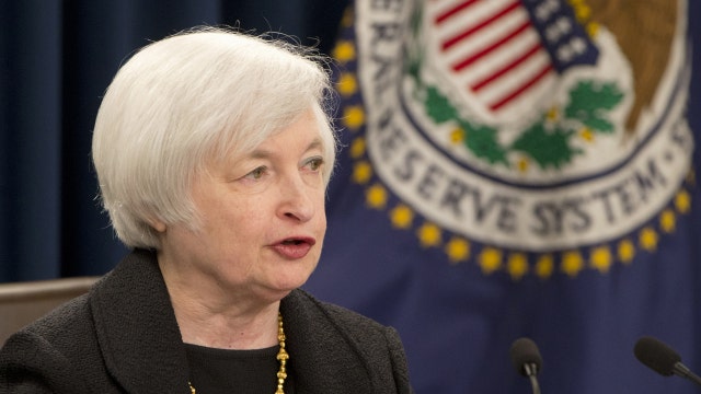 Markets close lower, dollar boosted by Yellen comments