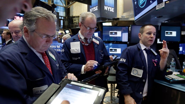 U.S. stocks close higher, Nasdaq ends losing streak
