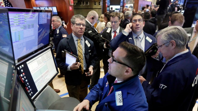 Dow climbs nearly 400 points on final day of gloomy January