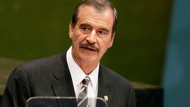 Former Mexican President Vicente Fox on Donald Trump's calls to build a wall along the border with Mexico, the Hispanics' voting for Trump in the Nevada caucus and Trump's broader support among Republicans.