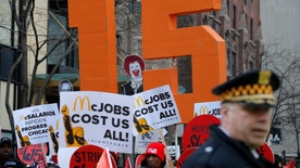 CKE Restaurants CEO Andy Puzder on the nationwide effort to increase minimum wage to $15 per hour for fast food workers. 