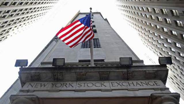 Stocks wavering after snapping 2-week winning streak