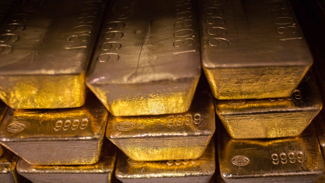 Invest in gold despite the negative sentiment?