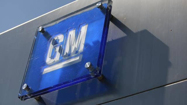 GM shares pull back on tepid 2014 outlook