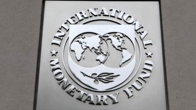 IMF raises global forecast for first time in two years