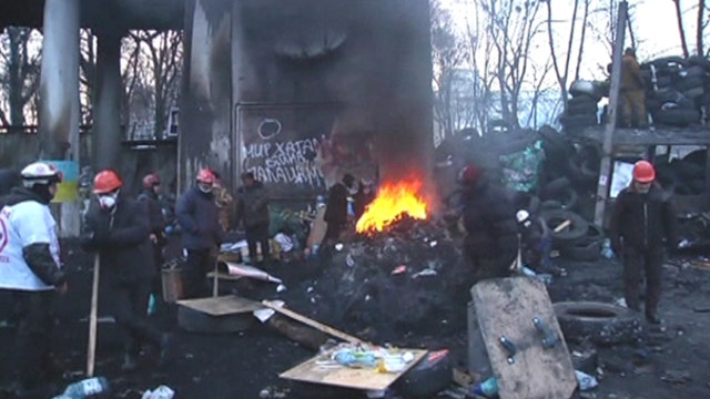 Ukraine backtracks on anti-protest laws