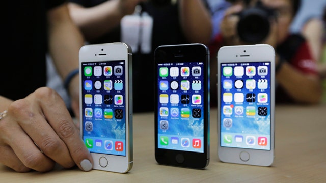 Apple CEO promises new product categories in 2014