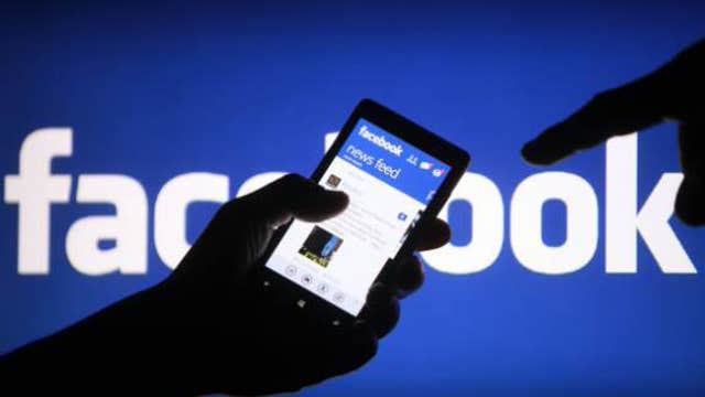 Facebook beats Street, boosted by mobile ad growth