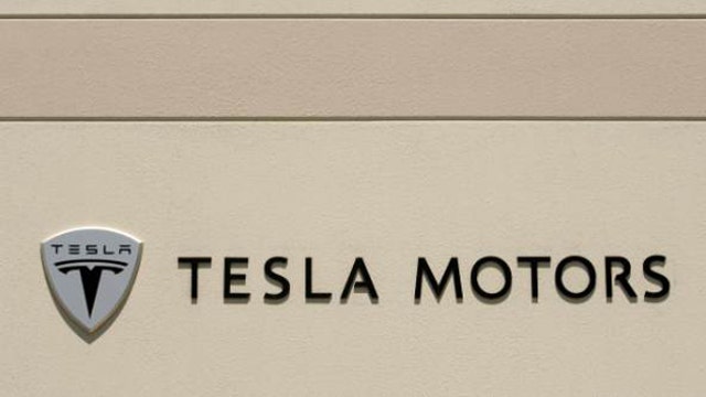 Tesla’s Model X on a road near you in 2015?