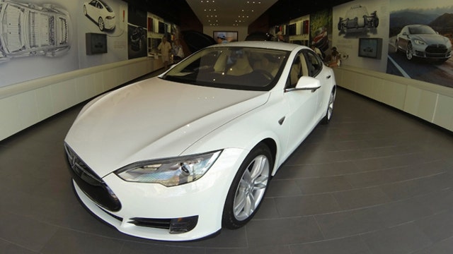 Tesla shares hit new 52-week high