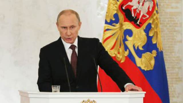 Putin signs treaty for Crimea to join Russia
