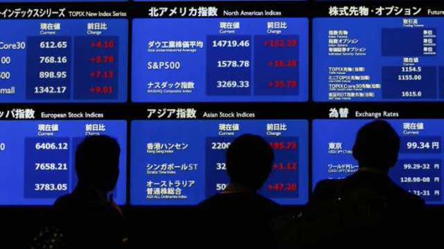 Asian markets mostly higher, Japan down on stronger Yen