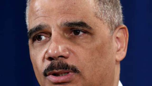 Should Holder be held in contempt?