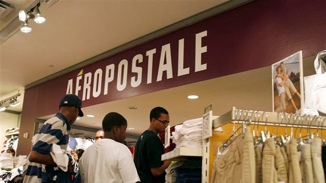 Downgrades weigh on Aeropostale shares