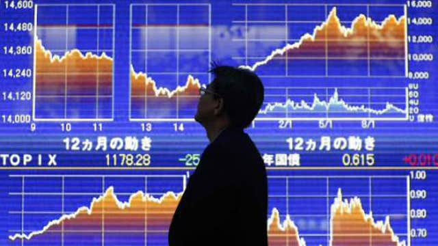 Asian markets mostly lower, Nikkei climbs