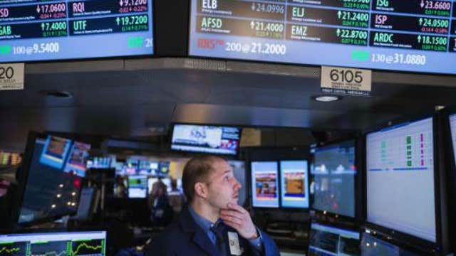 European shares mostly lower
