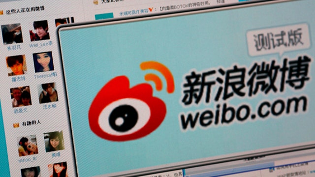 Weibo shares surge in Wall Street debut