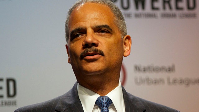 AG Eric Holder eyes banks for criminal charges