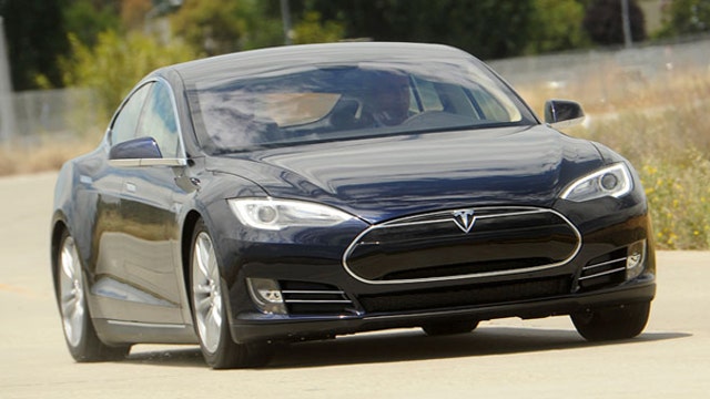 Tesla 1Q earnings top estimates