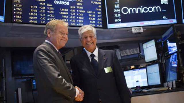 European shares lower, Omnicom and Publicis call off merger