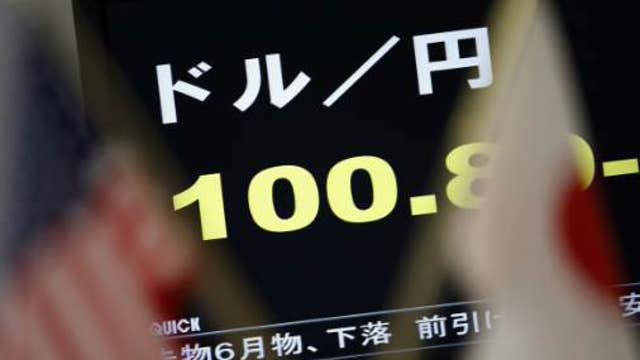 Dollar Passes 100-Yen Milestone