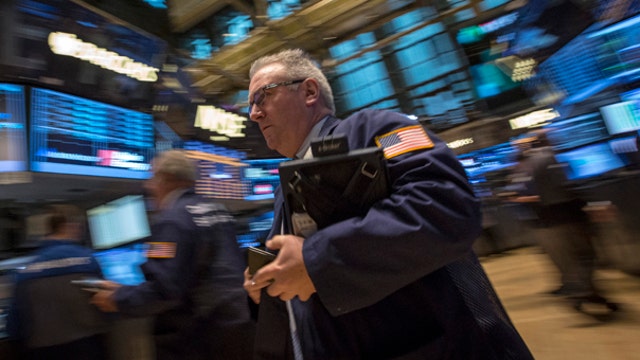 Should investors remain in stocks despite volatility?