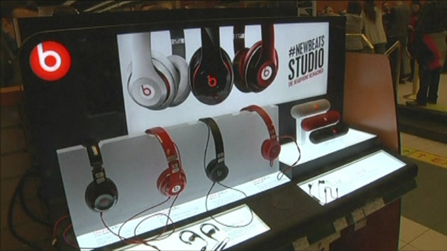 Apple shares get boost from Beats deal