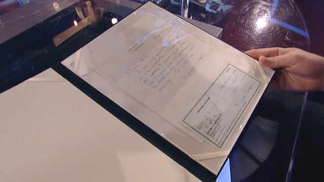 Rare Reagan letter and check to 11-year-old sells for $20K