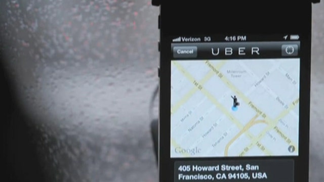 Uber under fire from cab drivers, lawmakers
