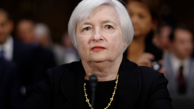 Yellen: Near-zero rates will continue after bond buying ends