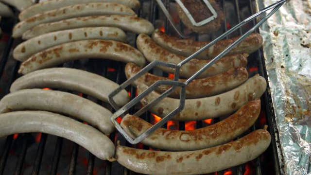 Serving up bratwurst for charity