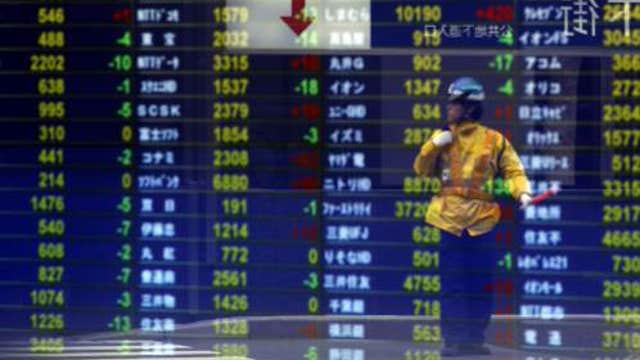 Asian shares move lower