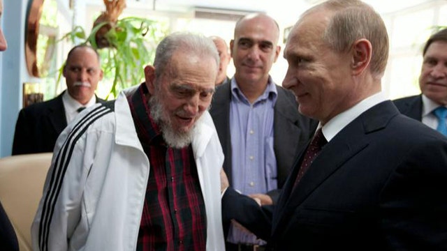 Putin, Castro make nice