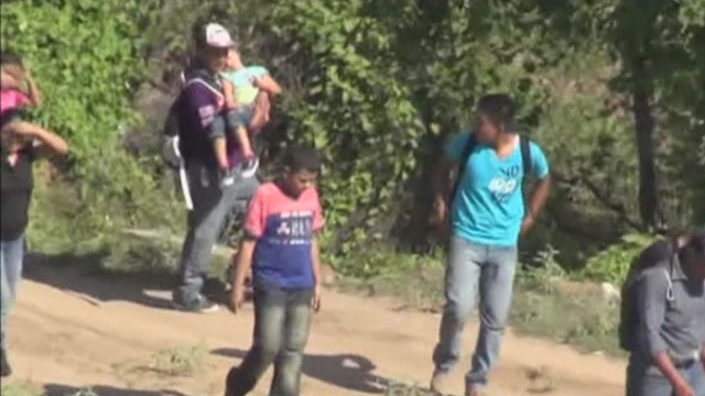 Redistribute foreign aid to pay for influx of immigrant children?