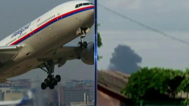 Traders reaction to Malaysia Airlines crash: Wait, buy and sell