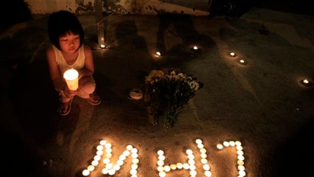 How should the global community respond to Flight MH17?
