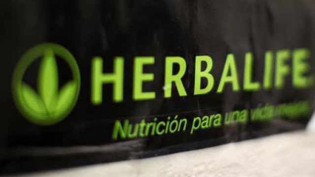 Herbalife 2Q earnings miss estimates