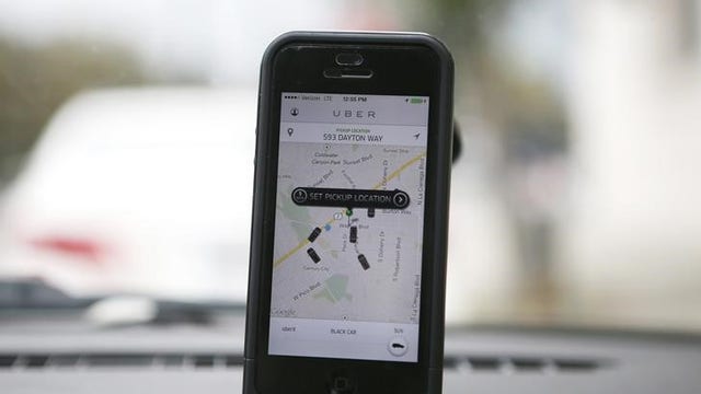 Uber, Airbnb courting business travelers