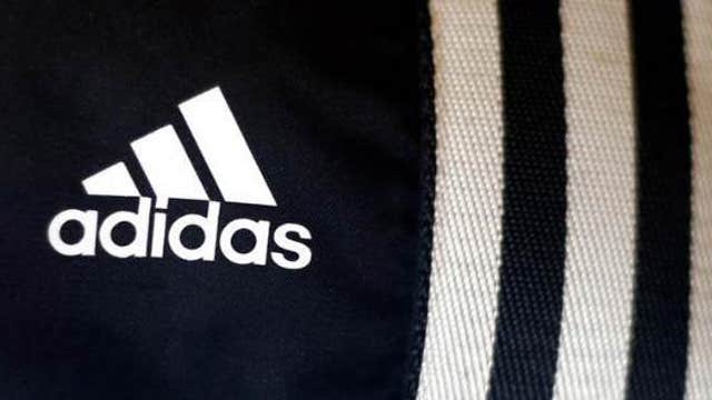 European markets mostly lower, Adidas warns on profit
