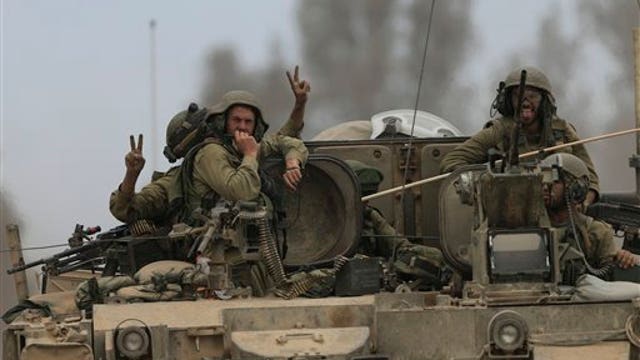 Israeli withdrawal comes as ceasefire begins