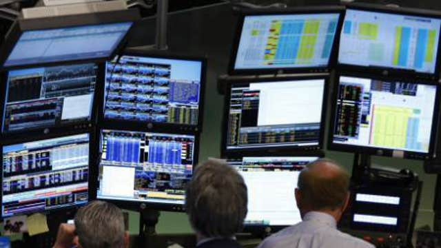 European shares mostly higher, PMI data mixed
