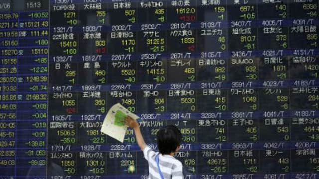 Asian markets mostly lower, Nikkei snaps losing streak