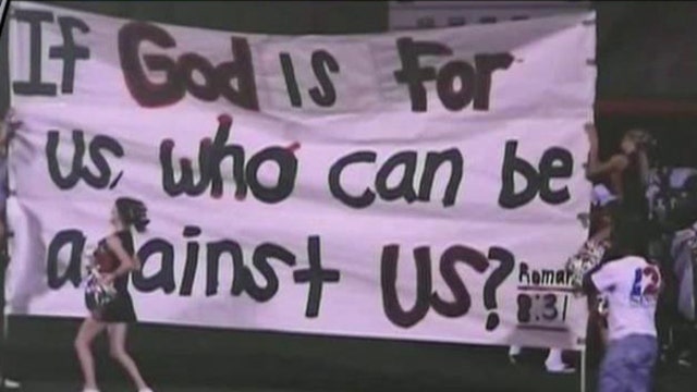 Texas cheerleaders’ Bible banners court case