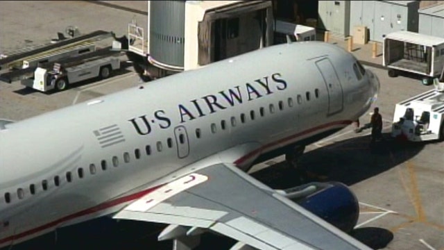DOJ Sues to Block AMR-US Airways Merger